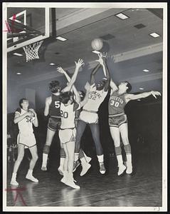 Up for Grabs-Brookline's Larry Higginbottom (32) and Brockton's Bill Tsitsos (30) battle for rebound in key Suburban League encounter. Ron McNeil (20) of Brookline and Brian Sullivan (53) of Brockton also contest.