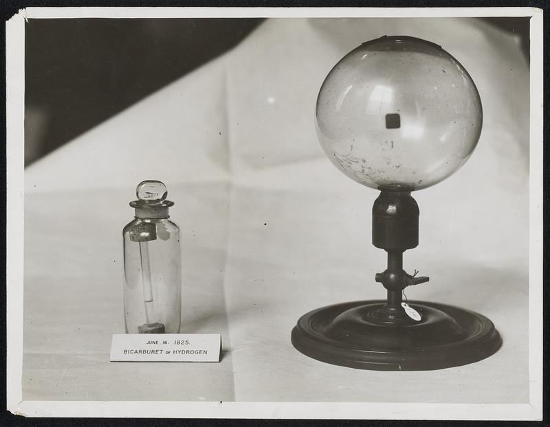 5. Exhibition of Scientific Apparatus at the Science Museum. South Kensington. Our photograph shows/(left) and flask of Trichloride of carbon. Benzine