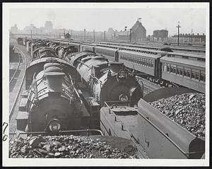 No Passengers Today-These trains and locomotives were kept in the Boston & Maine's East Cambridge yards today as the railroad strike paralyzed the nation.