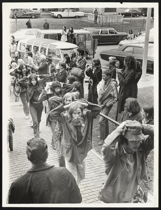 Spectators applaud as Veterans walk into Concord District Court with ...