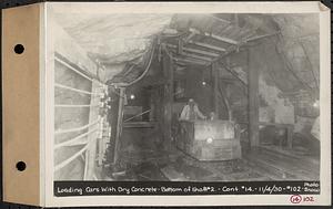 Contract No. 14, East Portion, Wachusett-Coldbrook Tunnel, West Boylston, Holden, Rutland, loading cars with dry concrete, bottom of Shaft 2, Holden, Mass., Nov. 4, 1930