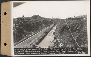 Contract No. 80, High Level Distribution Reservoir, Weston, looking west from Sta. 889+10+/- showing invert for upper pipe of twin aqueduct line, high level distribution reservoir, Weston, Mass., Apr. 2, 1940