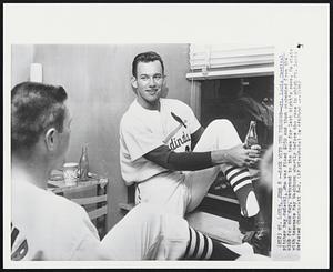 Back with the Fellows-- St. Louis Cardinal pitcher Ray Sadecki, who was fined $250 and then suspended from the club for one day, returned to the team for last night's game. He chats with teammate Ray Washburn shortly before the game in which St. Louis defeated Cincinnati 8-2.