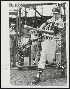 On the Road Back is Red Schoendienst, plucky Milwaukee Braves second baseman. Red is working out in the hopes of returning by Sept. 1. He apparently has won his battle with tuberculosis.