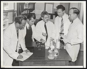 U.C. Researchists Form Five Man Team. Made possible by $250,000 gifts to the University, a modern research plan establishes the first Medical Physics laboratory in the world, representing a union of physics, medicine, chemistry, bacteriology, biology and genetics governed by a five man team of scientists. Leader of the group is Dr. John H. Lawrence who is in charge of medical investigations with the cyclotron developed by his Nobel Prize winning brother Dr. A. O. Lawrence. Left to right, the five man research team: Dr. Joseph G. Hamilton, medical chemist; Dr. Paul Aebersold, physicist; Dr. Robert S. Stone, radiologist; Dr. Alfred G. Marshak, animal biologist and geneticist; Dr. John H. Lawrence, clinical investigator in charge of medical work with the cyclotron.