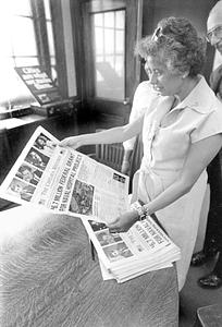 Secretary Harris reading the Record