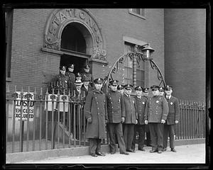 A group of police standing in front of Station 5