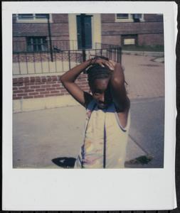 Girl with arms on her head