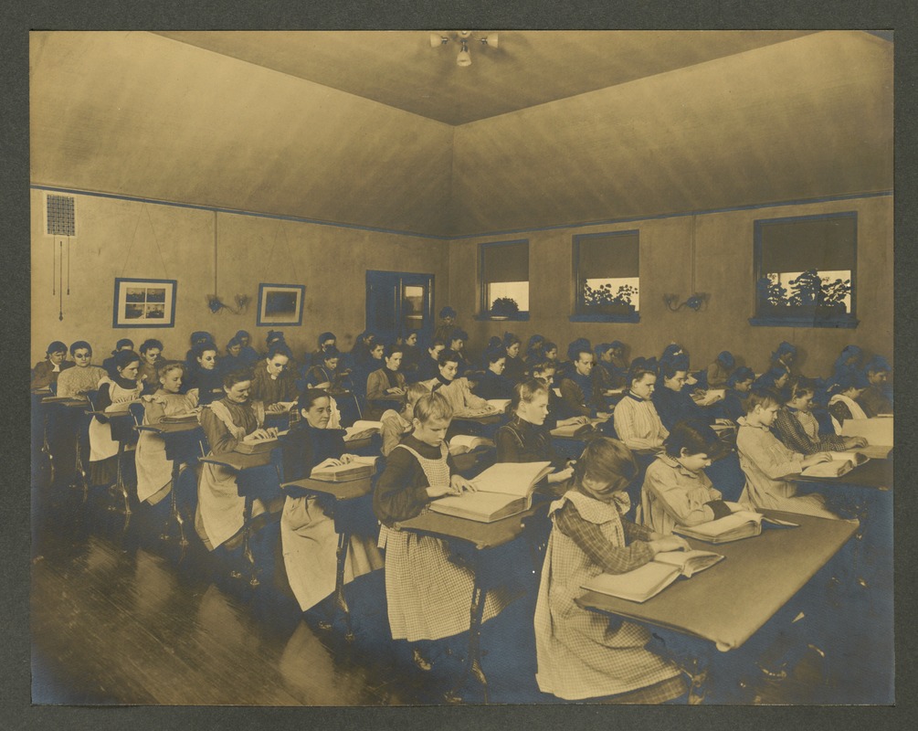 Girls in their reading room (room opens out of library), Overbrook School for the Blind, Philadelphia