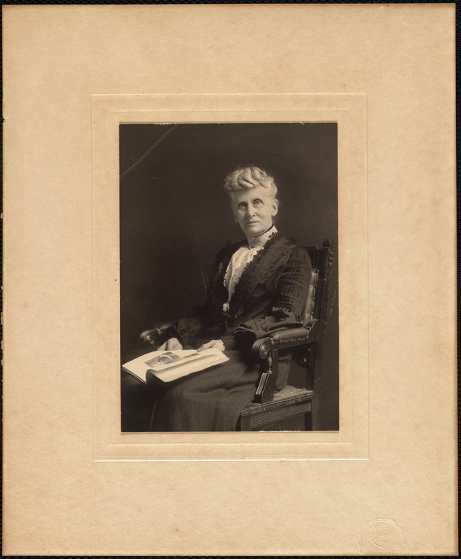 Woman seated in chair portrait