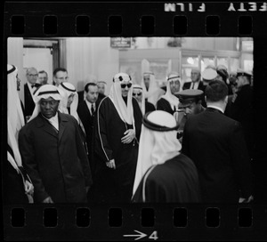 King Saud surrounded by men