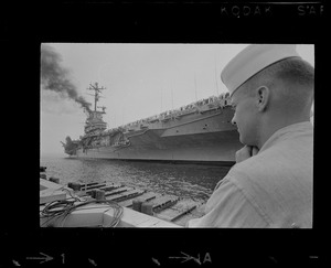 Seaman looking at USS Wasp