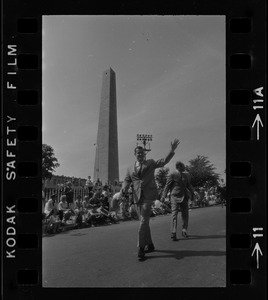 Man waving in Bunker Hill Day Parade