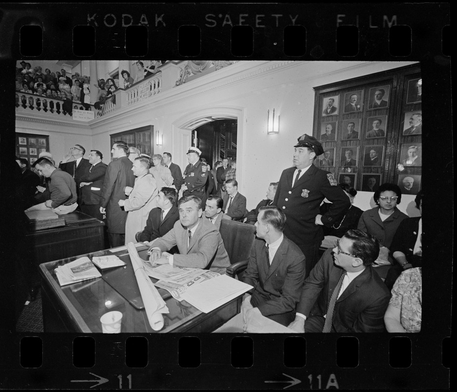 Police Officer Standing Behind City Councilors And Boston Redevelopment ...