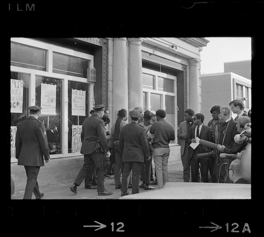 Police, reporters and others outside of Boston Redevelopment Authority South End office during sit-in