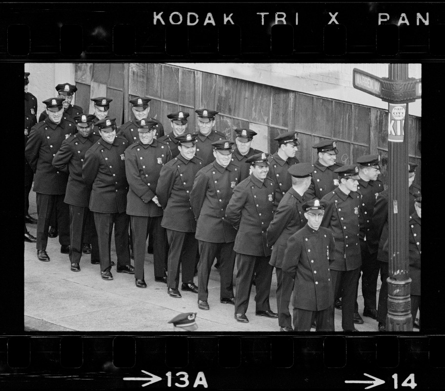 Police lined up nearby the Boston Redevelopment Authority South End office