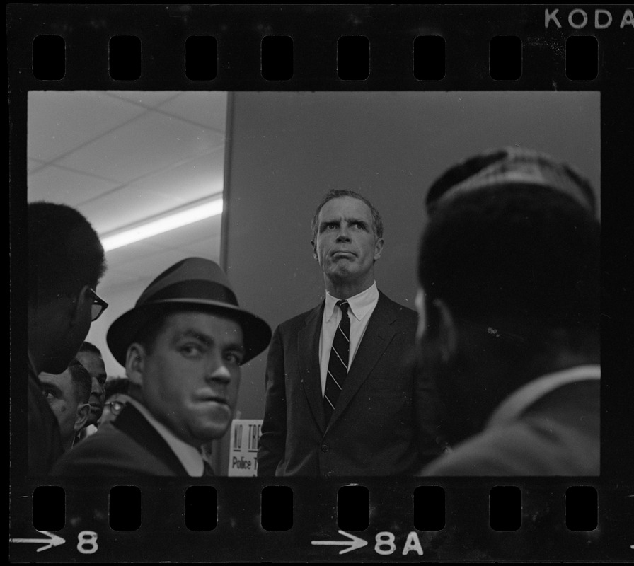 Mayor Kevin White speaking inside Boston Redevelopment Authority office during BRA sit-in