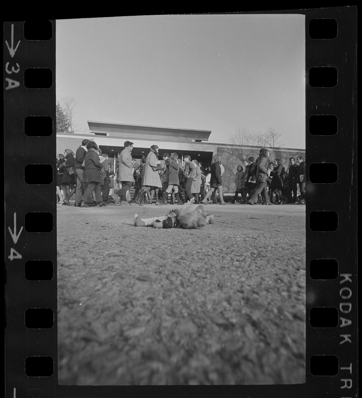 Symbolic doll seen on ground during Vietnam protest and sit-in at Brandeis University