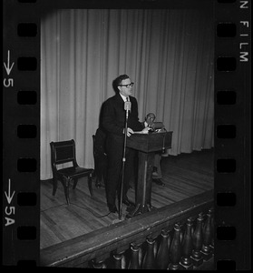 Kenneth T. Lyons, National President of the National Association of Shipyard Workers, speaking at a podium during a mass meeting at the navy yard