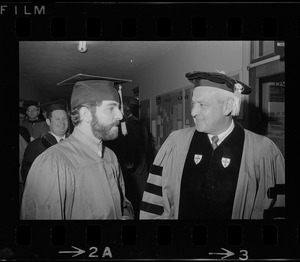 Joseph Radovsky, Norwood, class Valedictorian for the first graduating class of the Boston University School of Law, talks with David Bazelon, Chief Judge, Court of Appeals for the District of Columbia Circuit