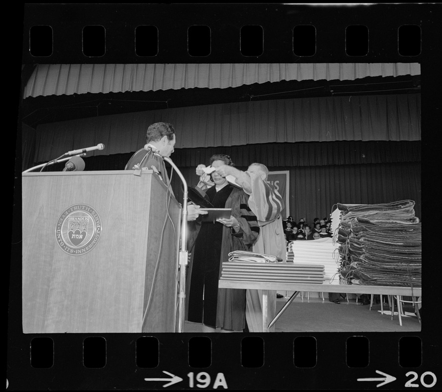 Coretta Scott King seen on stage receiving an honorary degree at the Brandeis University commencement exercises