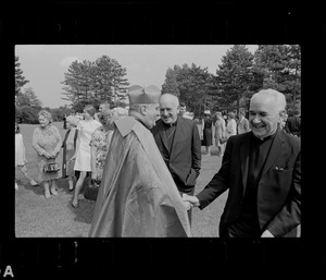 Catholic officials shaking hands