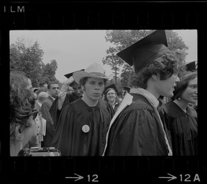 Student at Brandeis University commencement exercises wearing a robe and cowboy hat