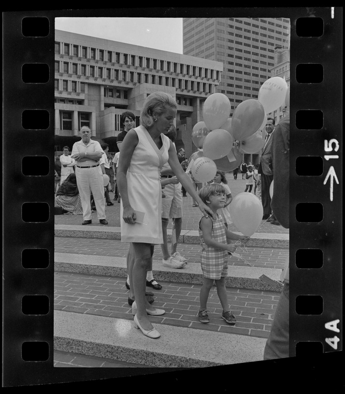 Mrs. Kevin White and son Christopher releasing balloons during Day of Good Wishes event at City Hall Plaza