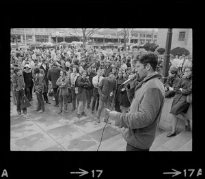 Student addressing crowd during rally in support of SDS members at Harvard