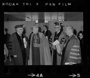 Former Supreme Court Chief Justice Earl Warren, Richard Cardinal Cushing, U.S. Education Comr. James Allen, and Boston College President Rev. W. Seavey Joyce at Boston College commencement