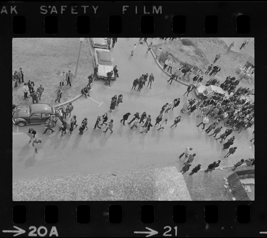 Birdseye view of people walking around campus during Boston College sit-in