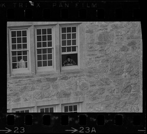 Student seen in Gasson Hall window at Boston College sit-in by 30 black students