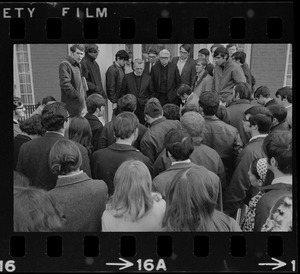 B.C. President Rev. W. Seavey Joyce speaks to a group of students outside of his home on campus during Boston College sit-in by 30 black students