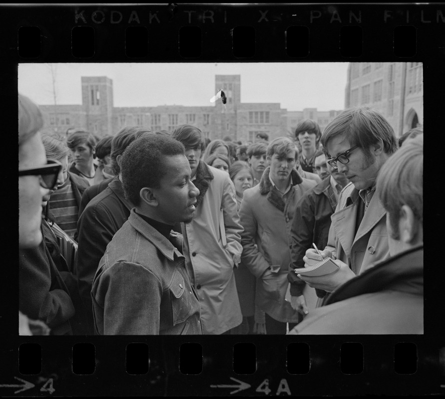 Black student representative being interviewed during Boston College sit-in by 30 black students