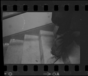 View of a foot on stairs during Boston College during sit-in
