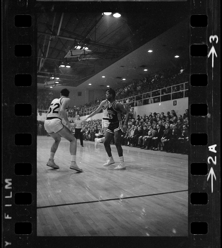 Boston College and Providence College players in a basketball game