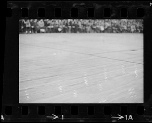 View of basketball court with crowd in background