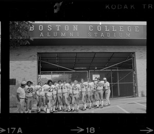 Boston College football team members outside of Boston College Alumni Stadium