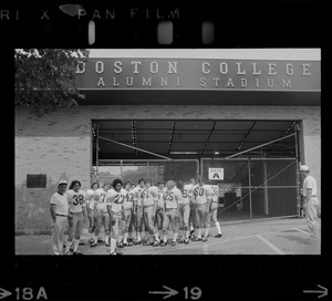 Boston College football team members outside of Boston College Alumni Stadium