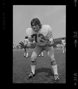 Boston College football player (no. 73) poses in position