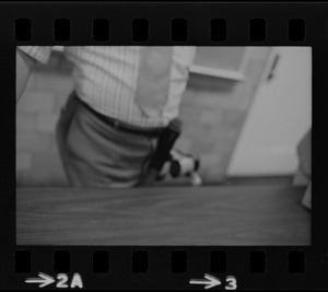 Waist and table, out of focus