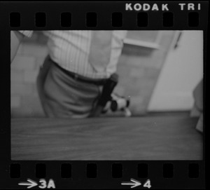 Waist and table, out of focus