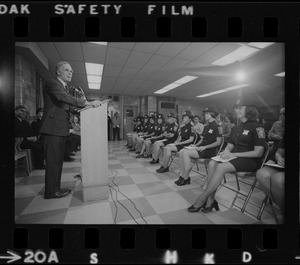 The newest uniformed members of the Boston Police Department listen as Mayor Kevin White address their graduation class at the Police Academy