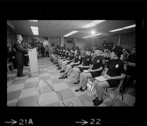 The newest uniformed members of the Boston Police Department listen as Mayor Kevin White address their graduation class at the Police Academy