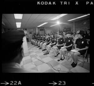 The newest uniformed members of the Boston Police Department listen as Mayor Kevin White address their graduation class at the Police Academy