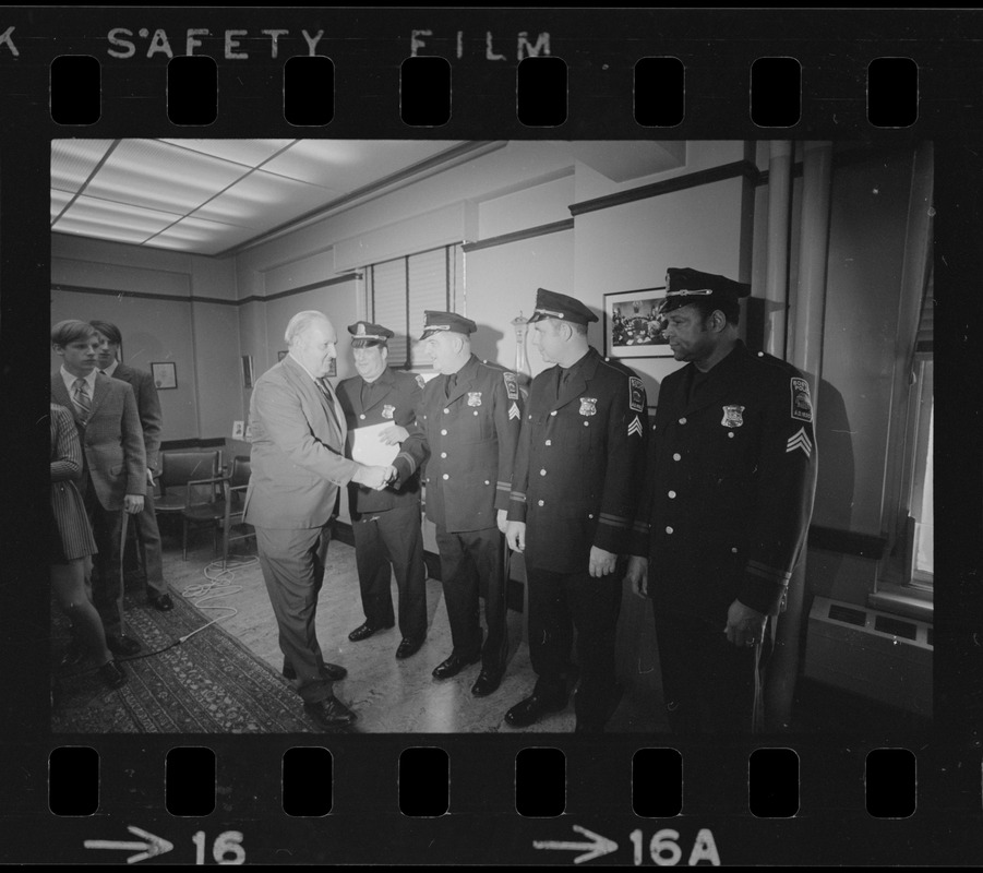 Police commissioner Edmund L. McNamara with newly promoted lieutenants  Joseph V. Mills and Leroy B. Chase - Digital Commonwealth