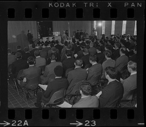 New police department recruits seated during ceremony to begin training