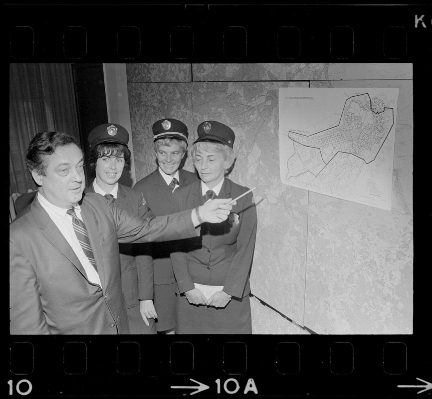 Boston Traffic Comr. William R. McGrath points out high fine area designated as Zone A to meter maids Lee Raftery, Mary Martin and Virginia Hartling