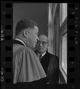 Senator Edward W. Brooke and U.N. Secretary General U Thant talking in front of window before Boston University commencement