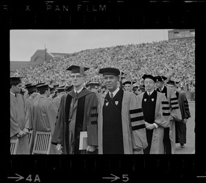 N.A.A.C.P. leader Roy Wilkins, right, in procession at Boston University commencement
